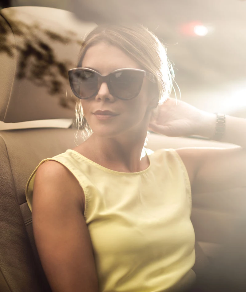 woman in convertible with sunglasses | Himmarshee Plastic Surgery in Fort Lauderdale